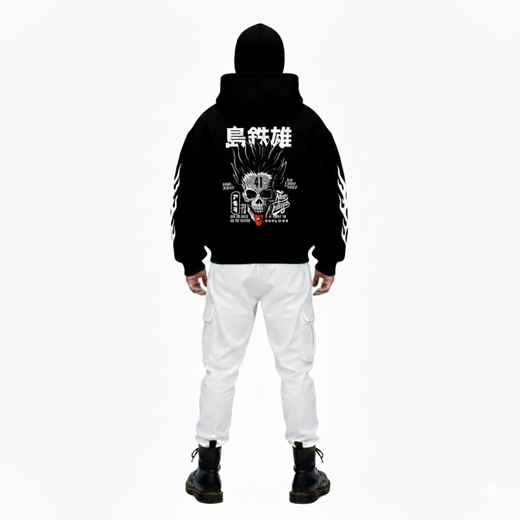 Person wearing a black hoodie with a graphic design on the back and white pants, standing against a white background.