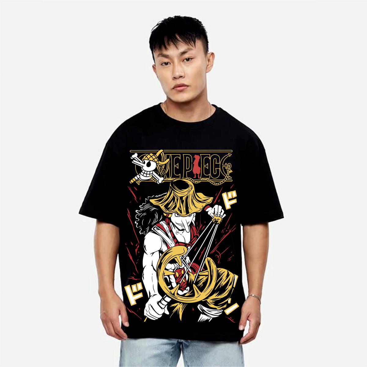 Person wearing a black t-shirt with a onepiece graphic design.
