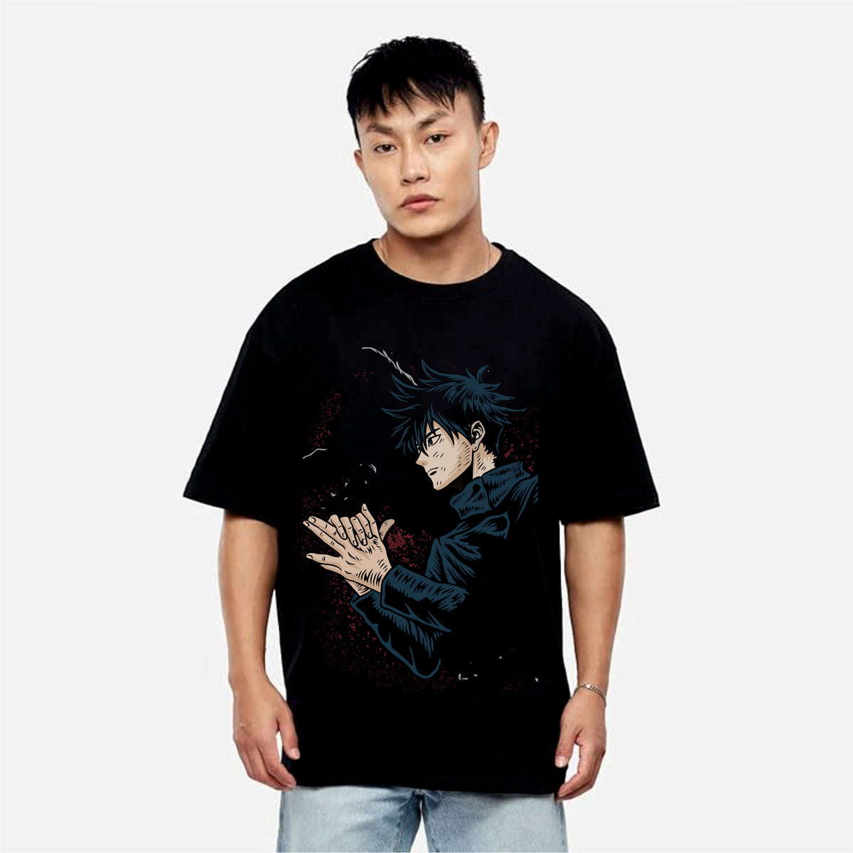 Person wearing a black t-shirt with an anime character design