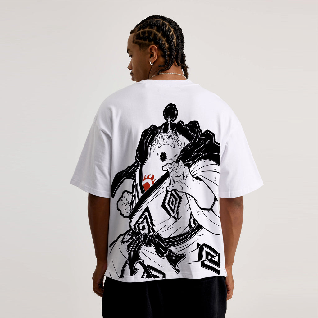Person wearing a white t-shirt with a black and white graphic design on the back, standing against a plain background.