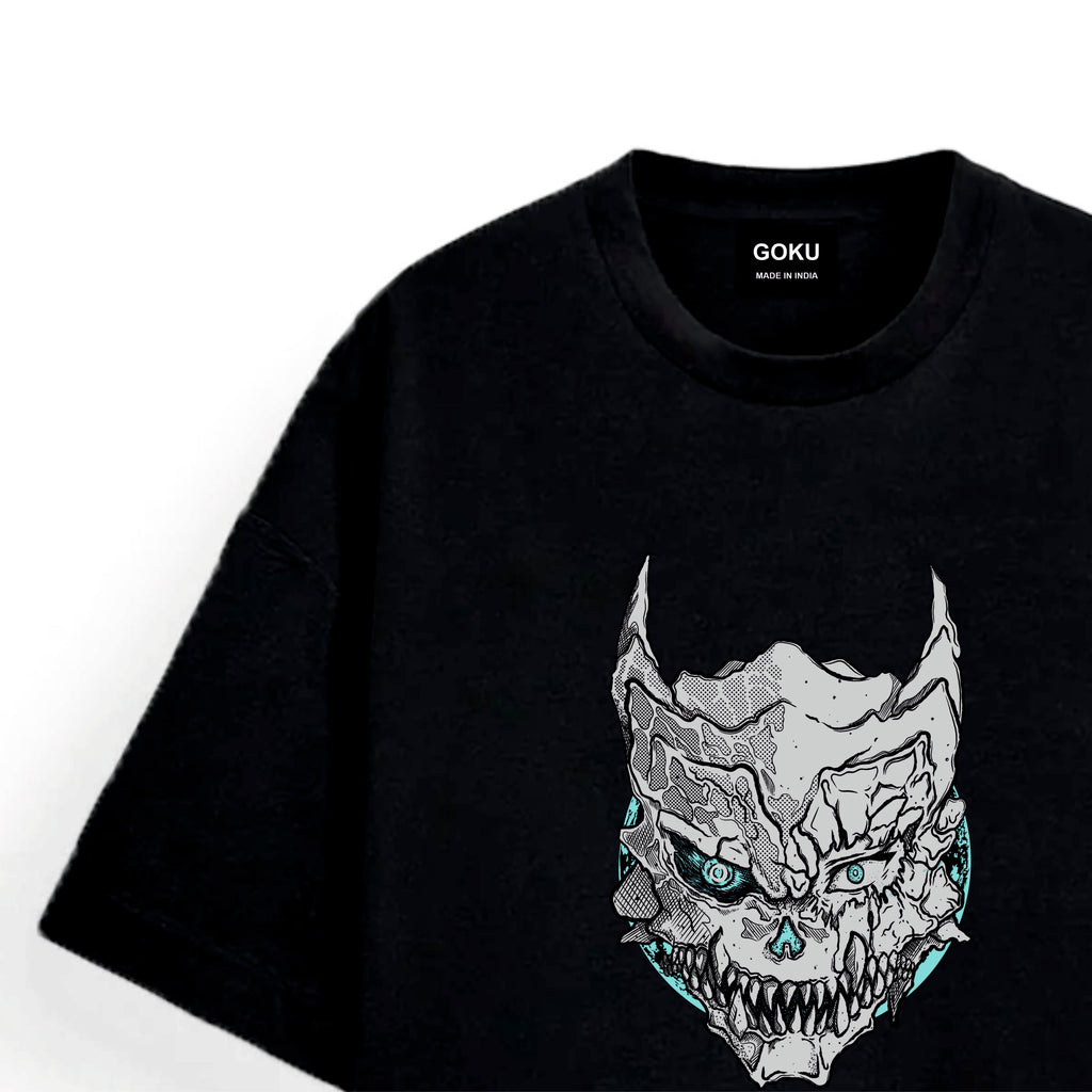 Black t-shirt with a graphic design of a skull with glowing eyes.