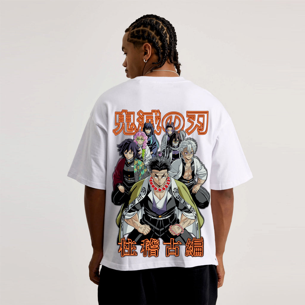Person wearing a white t-shirt with anime character design on the back