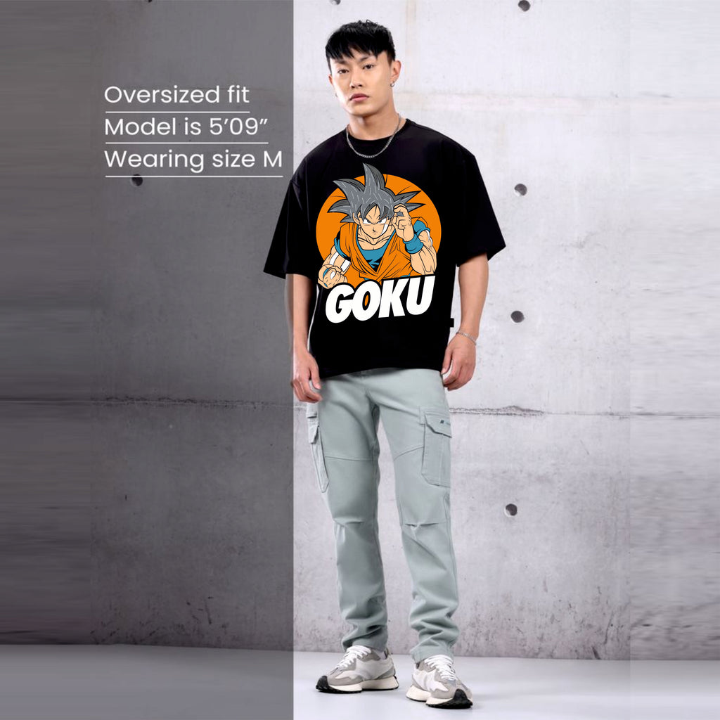 Person wearing a black t-shirt with a graphic Goku design