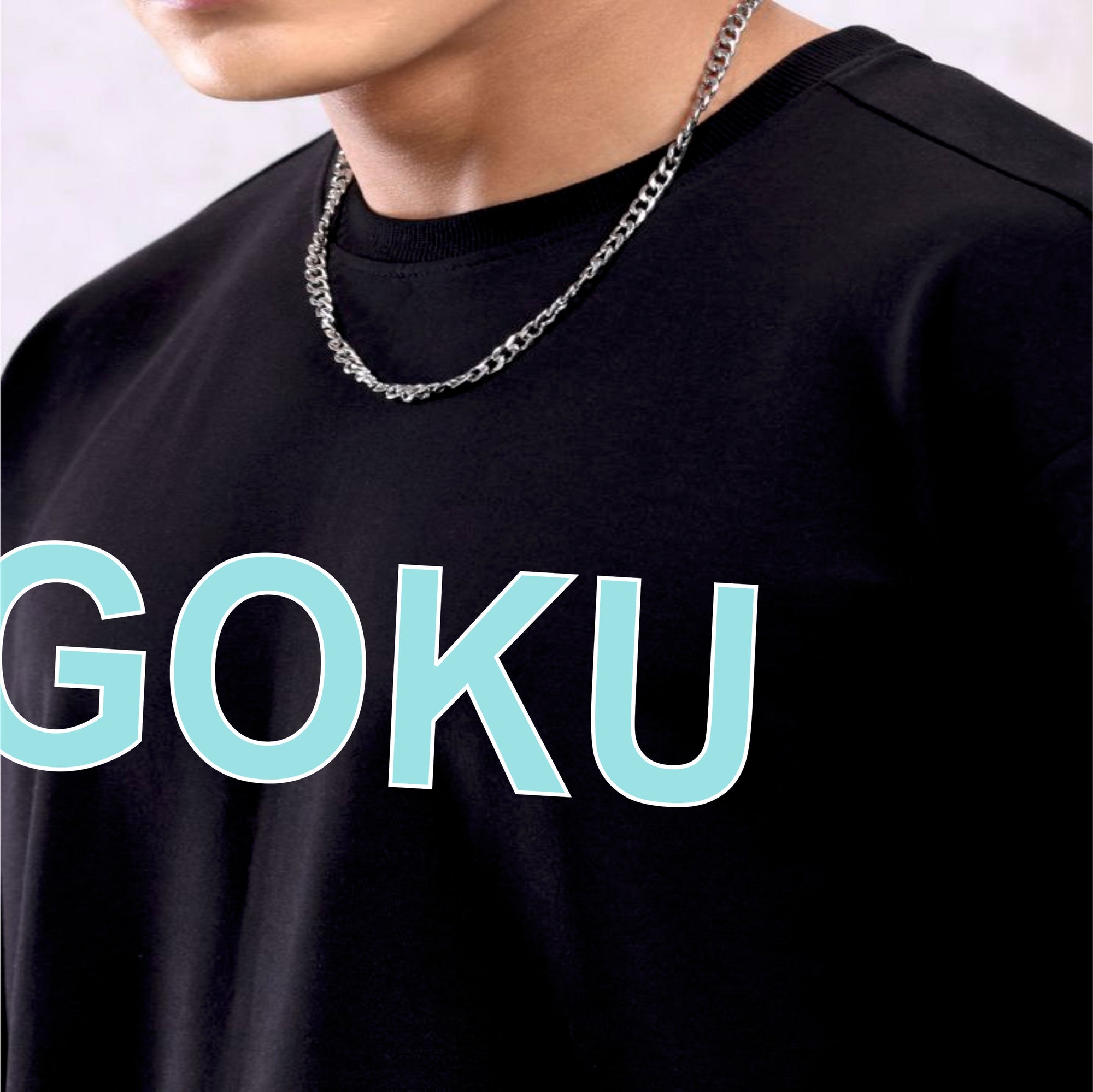 Black t-shirt with 'GOKU' printed in green