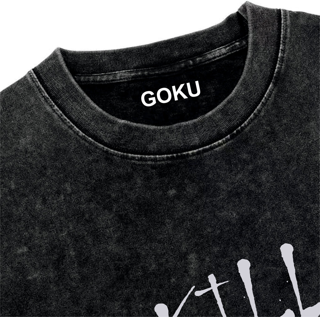 Black t-shirt with 'GOKU' printed on the collar
