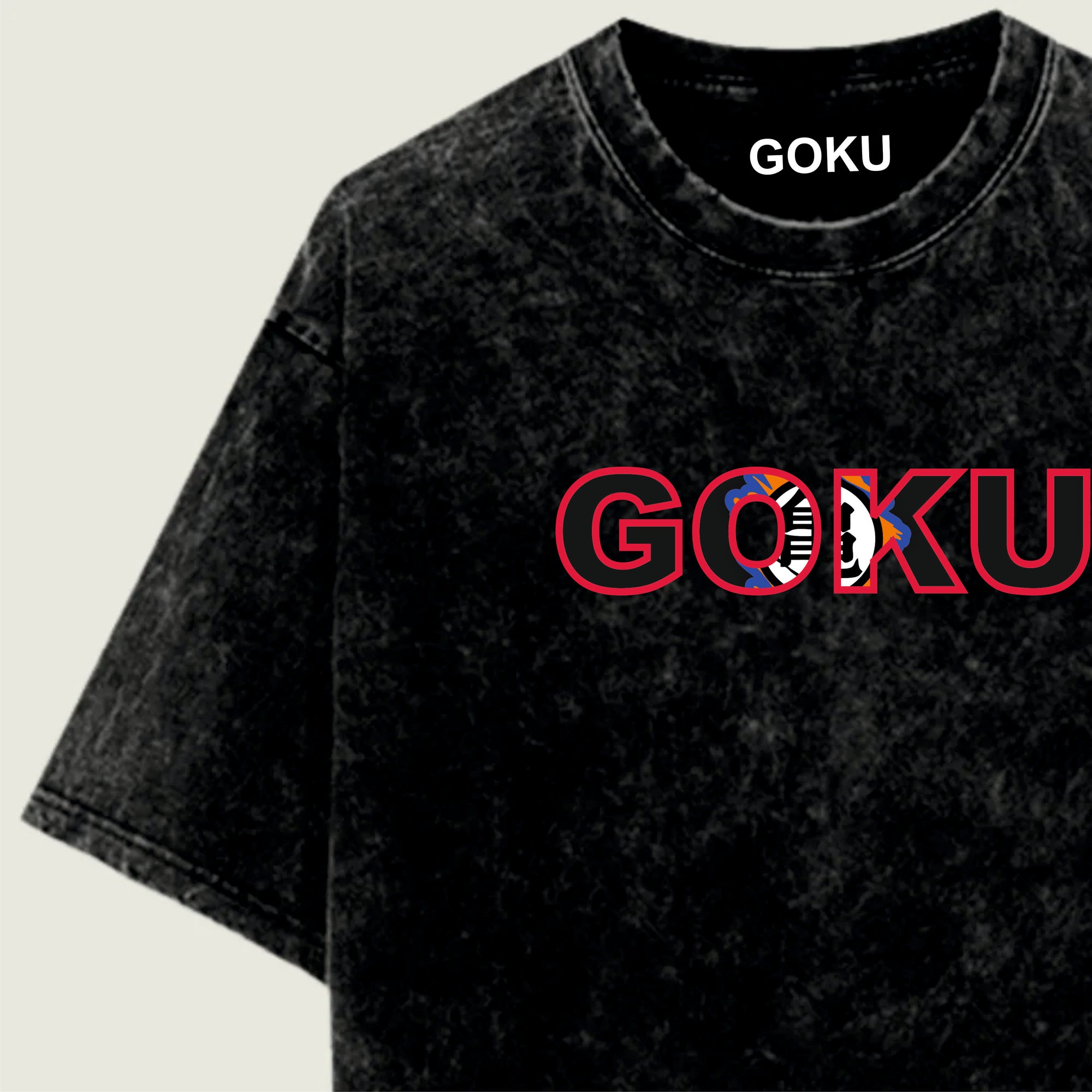 Black t-shirt with 'GOKU' printed on it against a beige background
