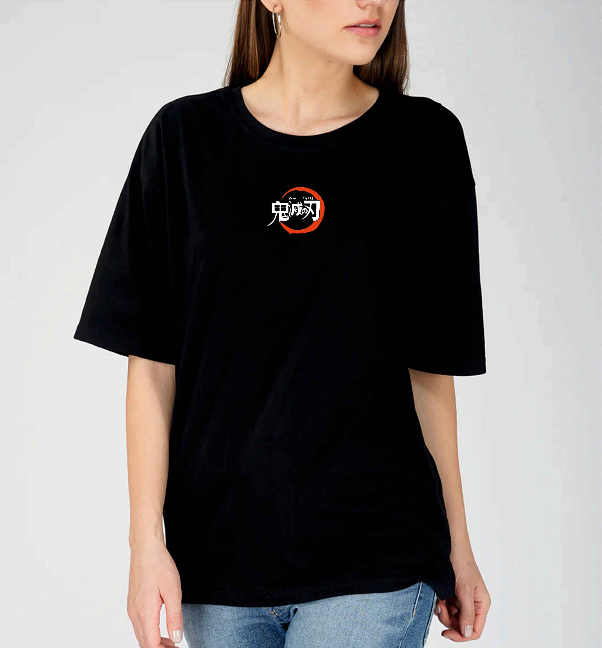Person wearing a black t-shirt with a red and white logo