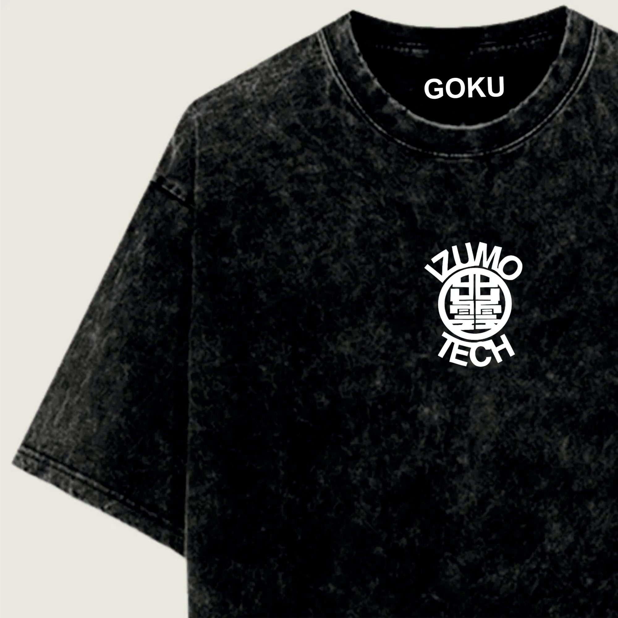 Black t-shirt with 'IZUMO TECH' logo and 'GOKU' text on a light green background
