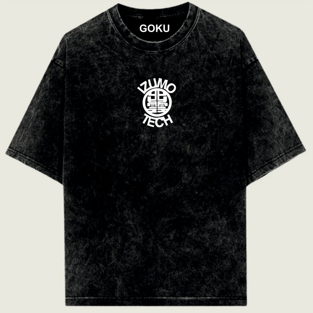 Black t-shirt with 'Goku' and 'Zumo Tech' logos on a light green background