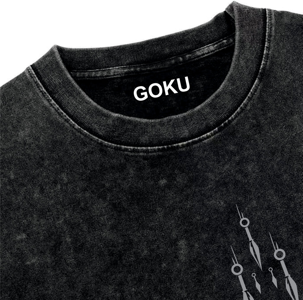 Black t-shirt with 'GOKU' printed on the collar against a white background