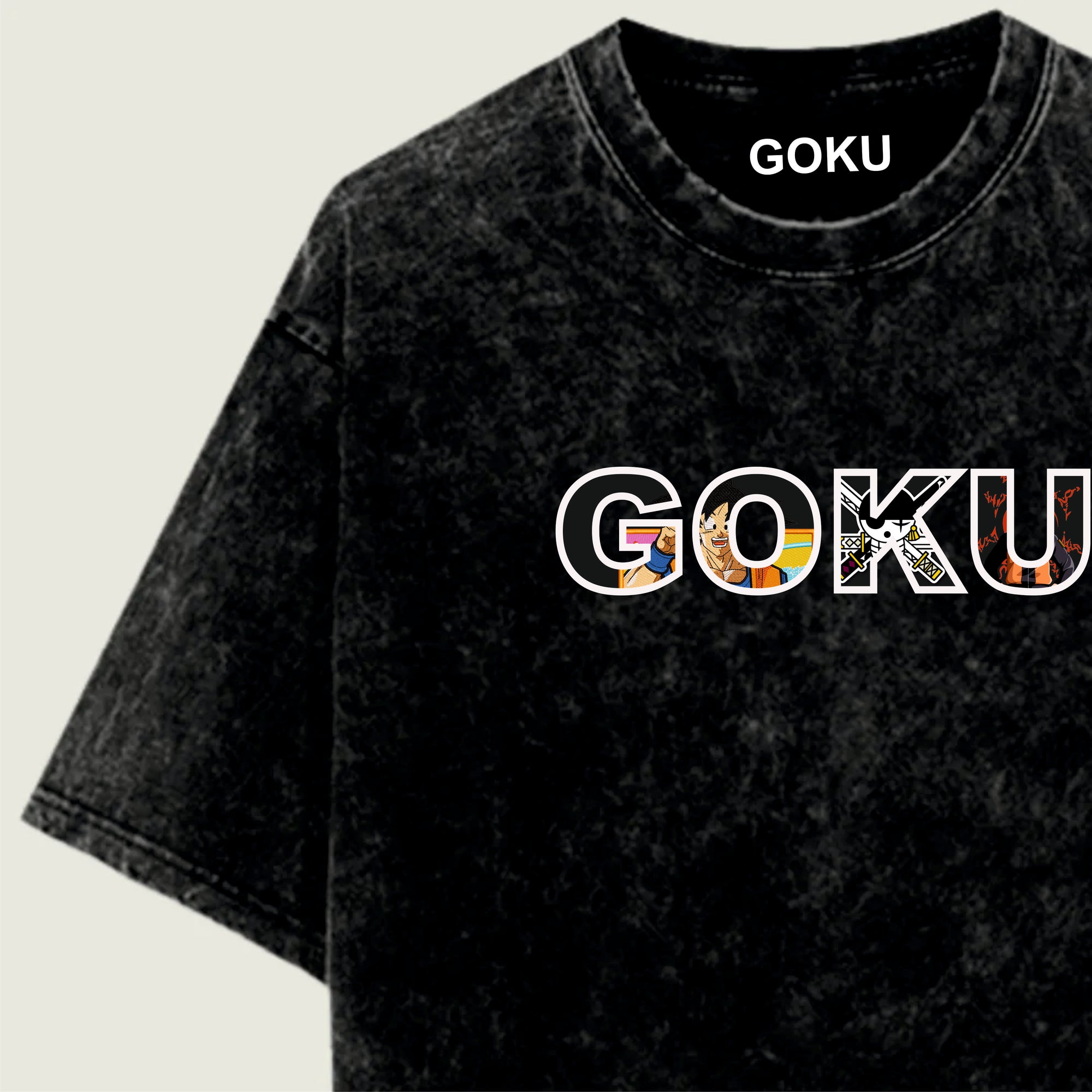 Black t-shirt with 'GOKU' printed on it against a light green background