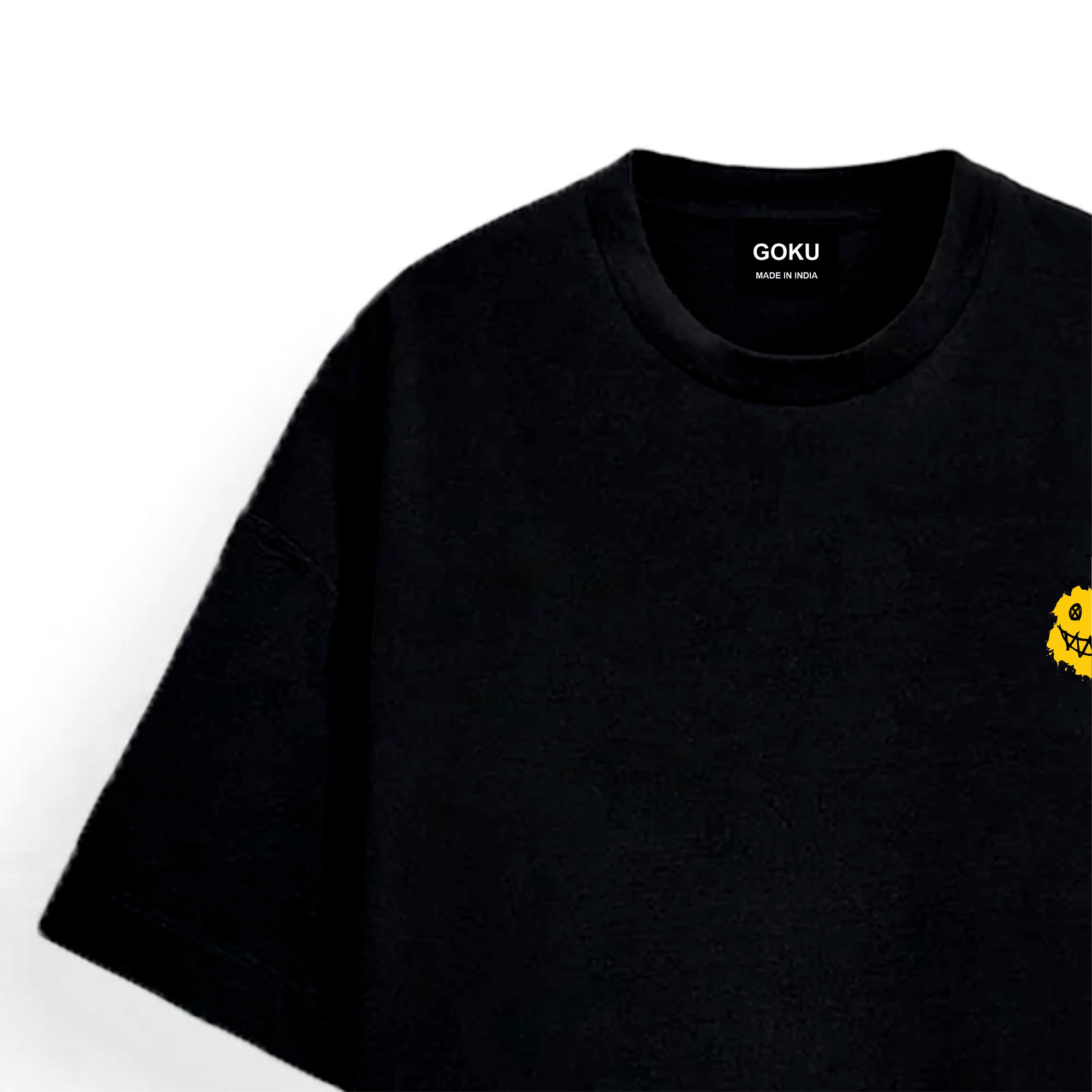 Black t-shirt with a small yellow character on the chest