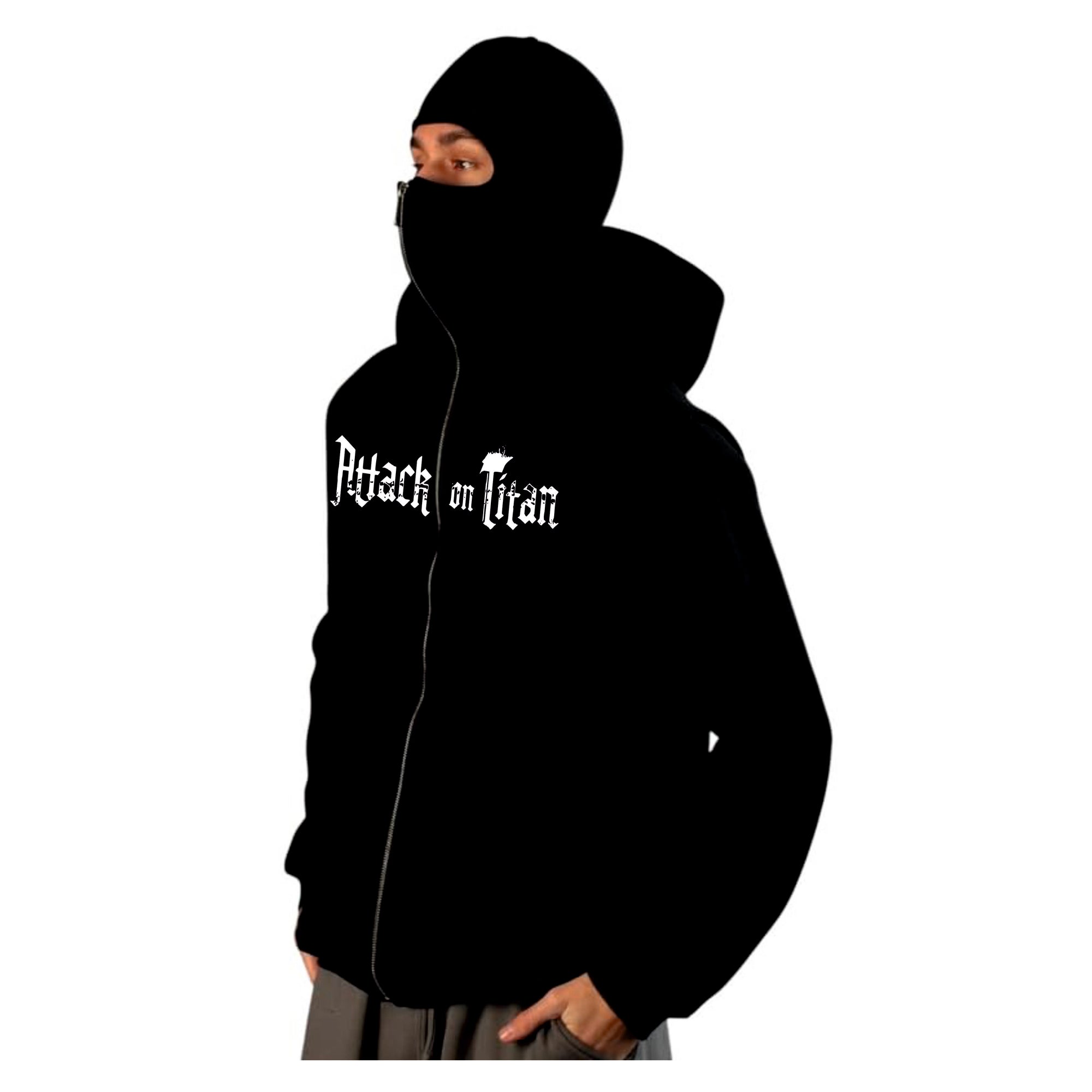 Black hoodie with 'Attack on Titan' text worn by a person WITH PUFF PRINTED