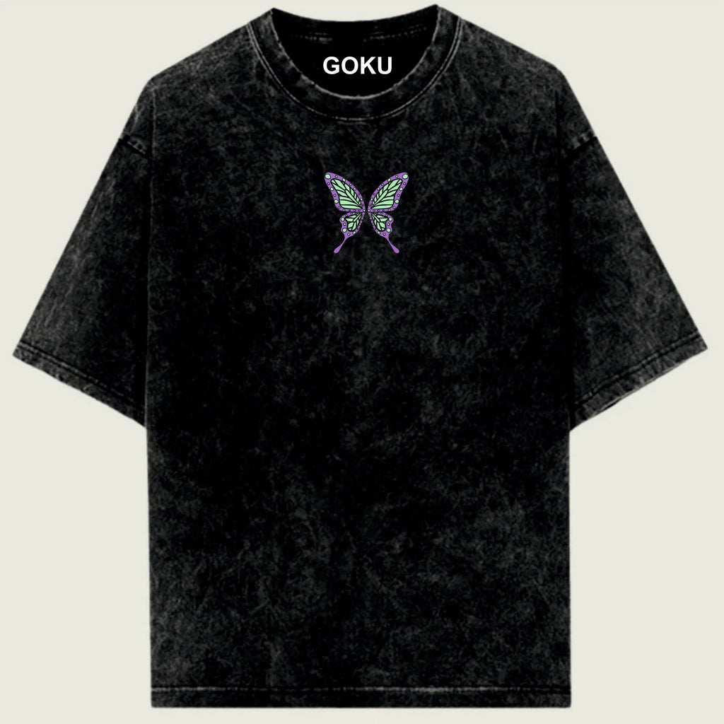 Black t-shirt with a butterfly design and 'GOKU' text on a light green background