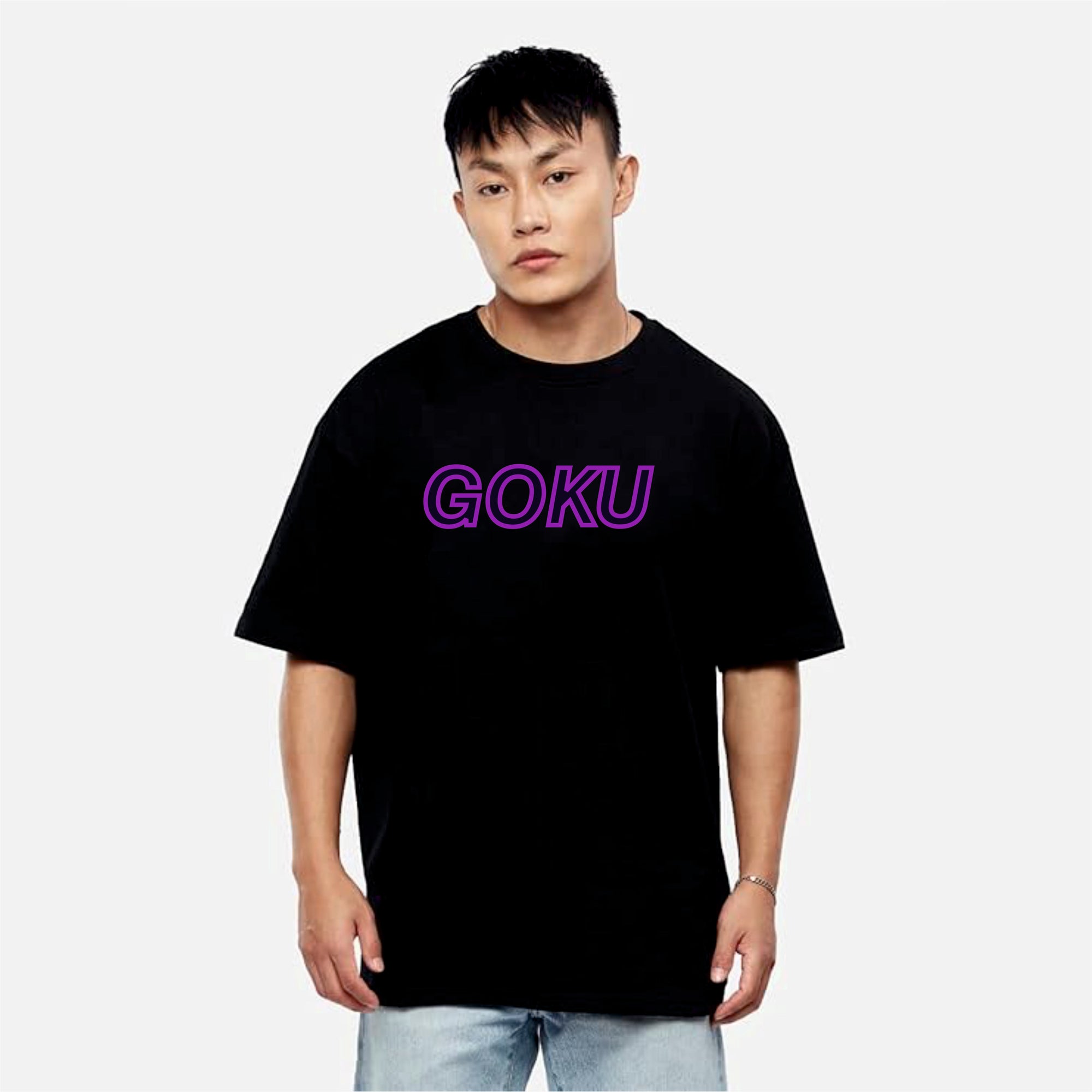 Person wearing a black t-shirt with 'GOKU' in purple on a white background