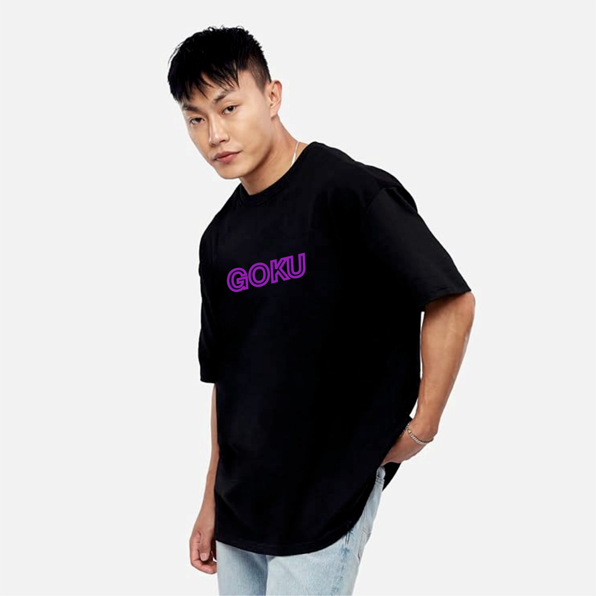 Person wearing a black t-shirt with 'GOKU' in purple on a light gray background