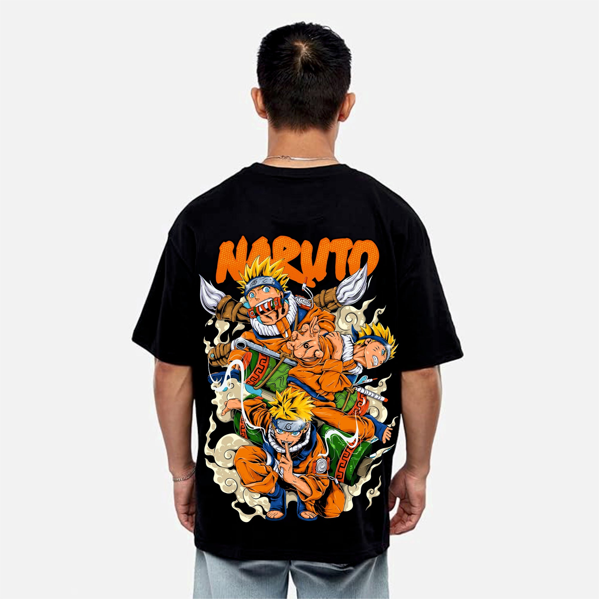 Person wearing a black t-shirt with 'Naruto' graphic design on the back.