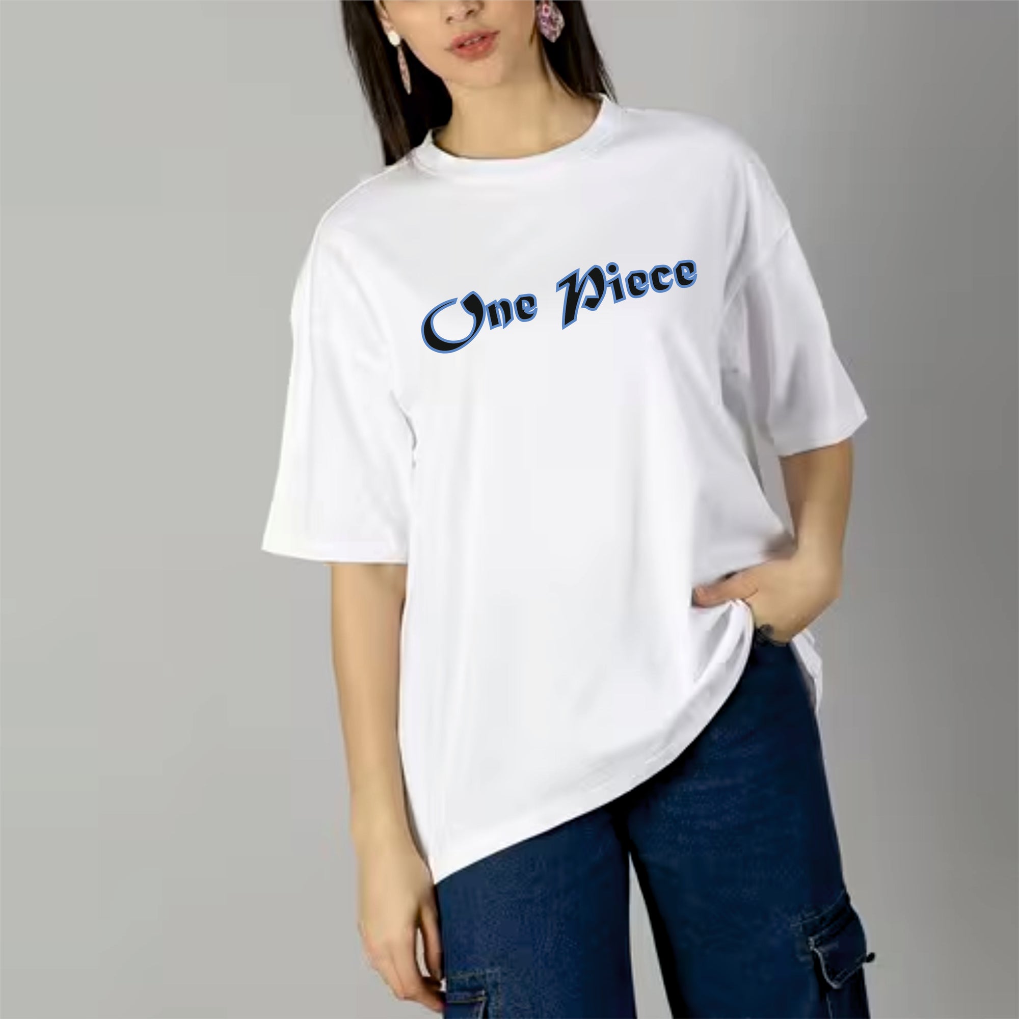Person wearing a white 'One Piece' t-shirt on a gray background