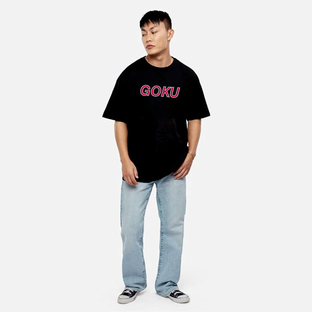 Person wearing a black t-shirt with 'GOKU' printed in pink on a white background