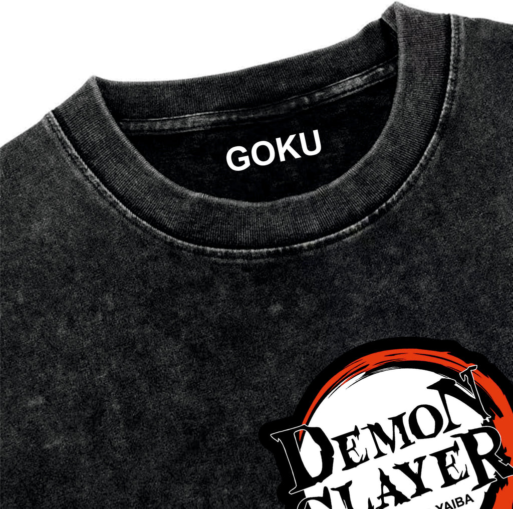 Black t-shirt with 'GOKU' printed on the collar and 'Demon Slayer' logo below.