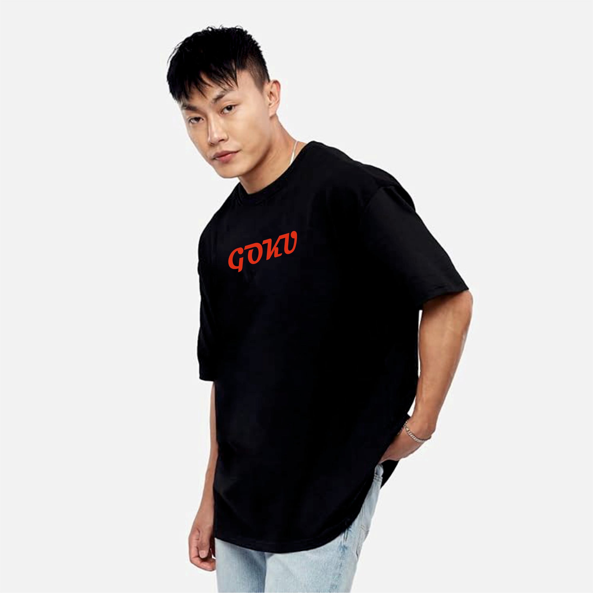 Person wearing a black t-shirt with red text
