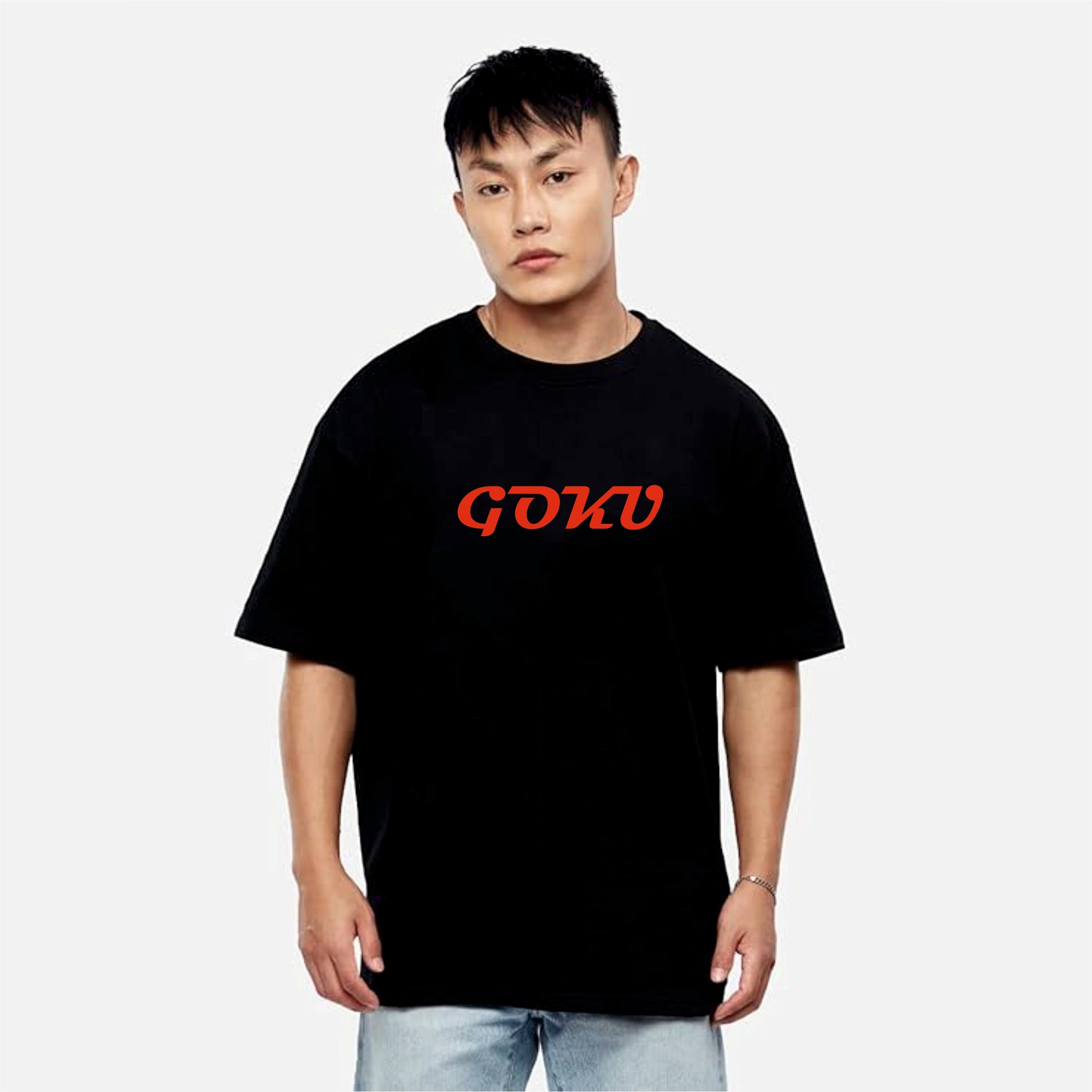 Person wearing a black t-shirt with red text