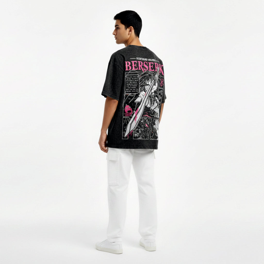 Person wearing a black t-shirt with graphic design and text on the back, standing against a white background