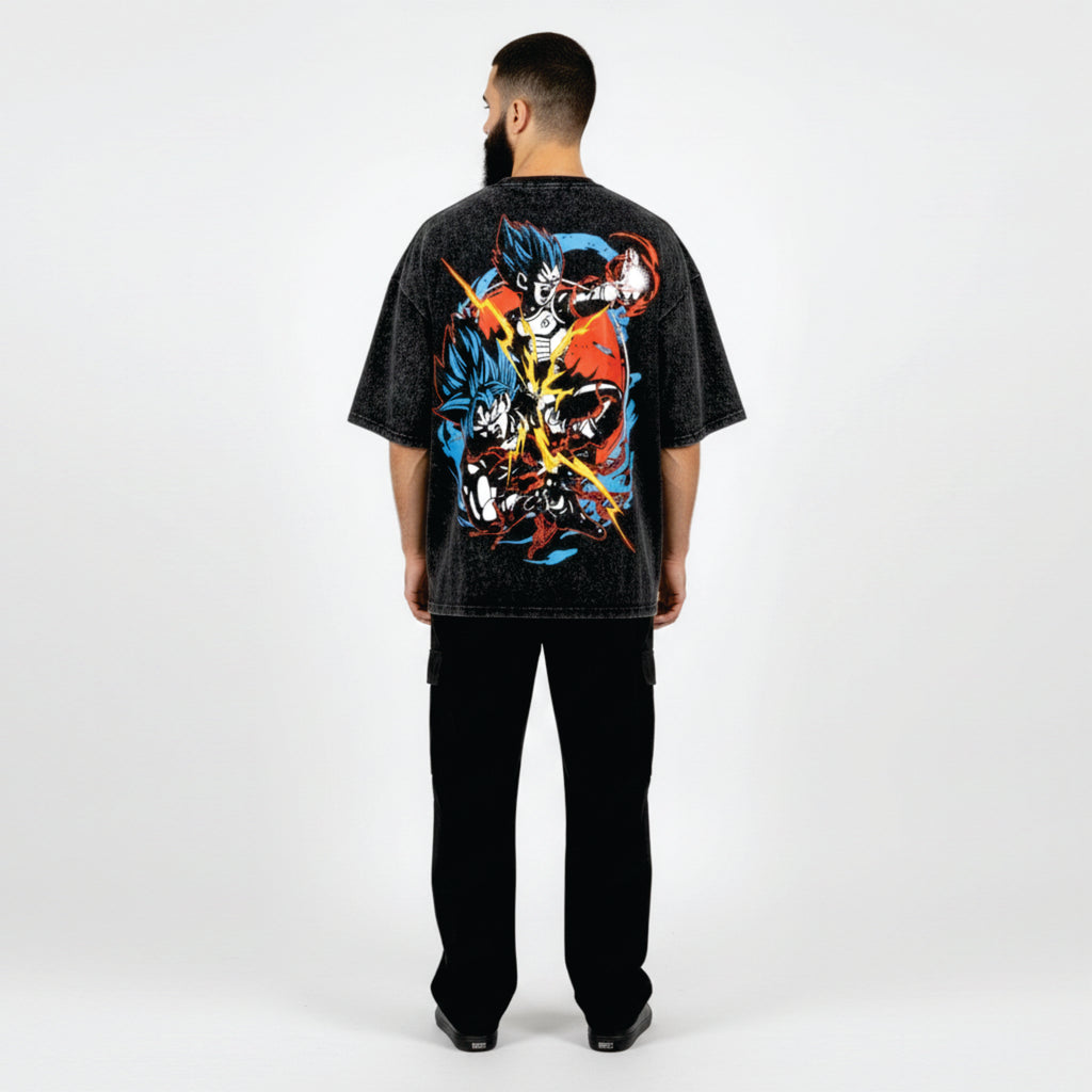 Person wearing a black t-shirt with colorful graphic design on the back against a white background