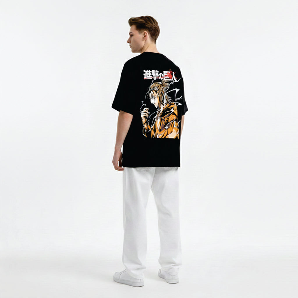 Person wearing a black t-shirt with anime design on a white background