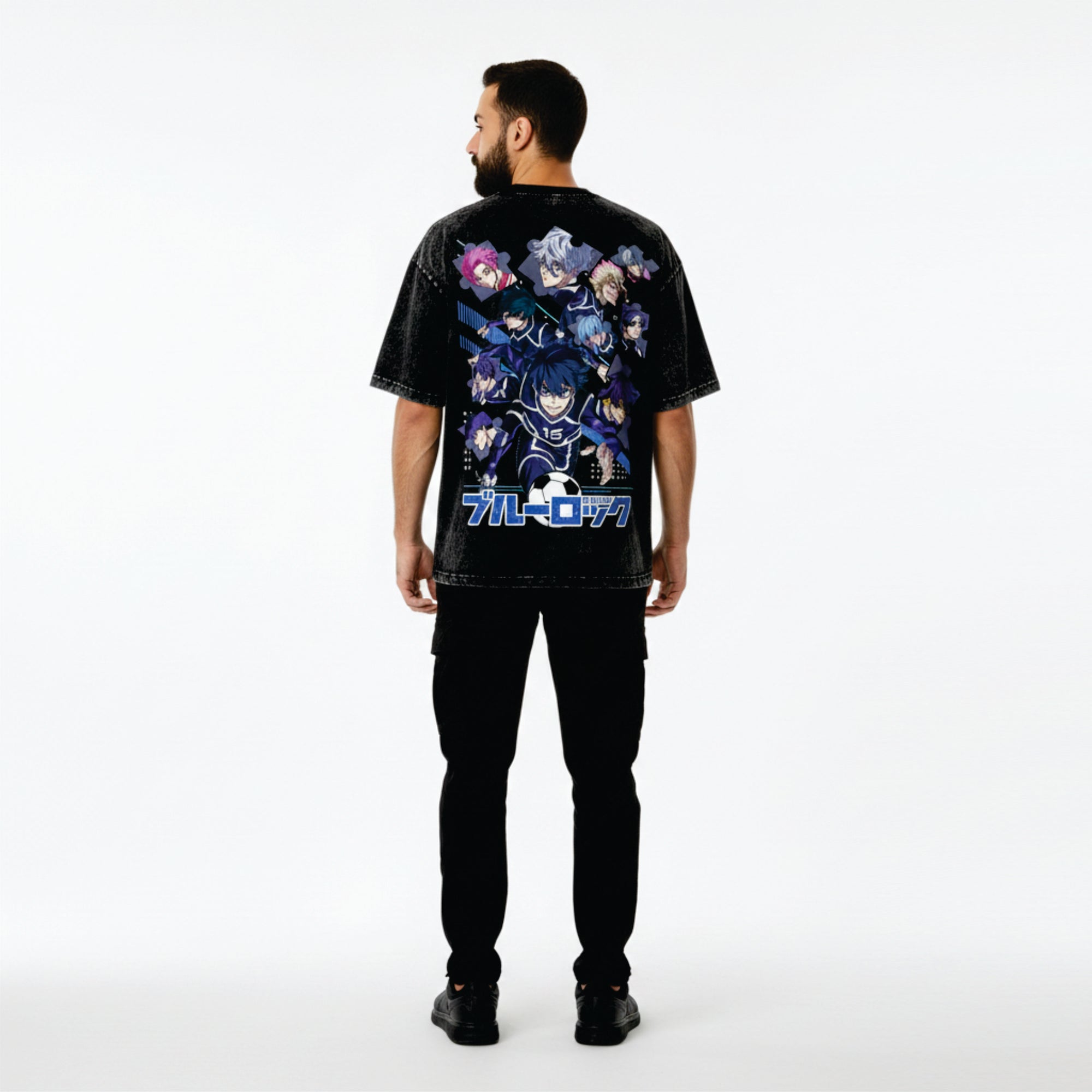 Person wearing a black t-shirt with colorful graphics on the back against a white background