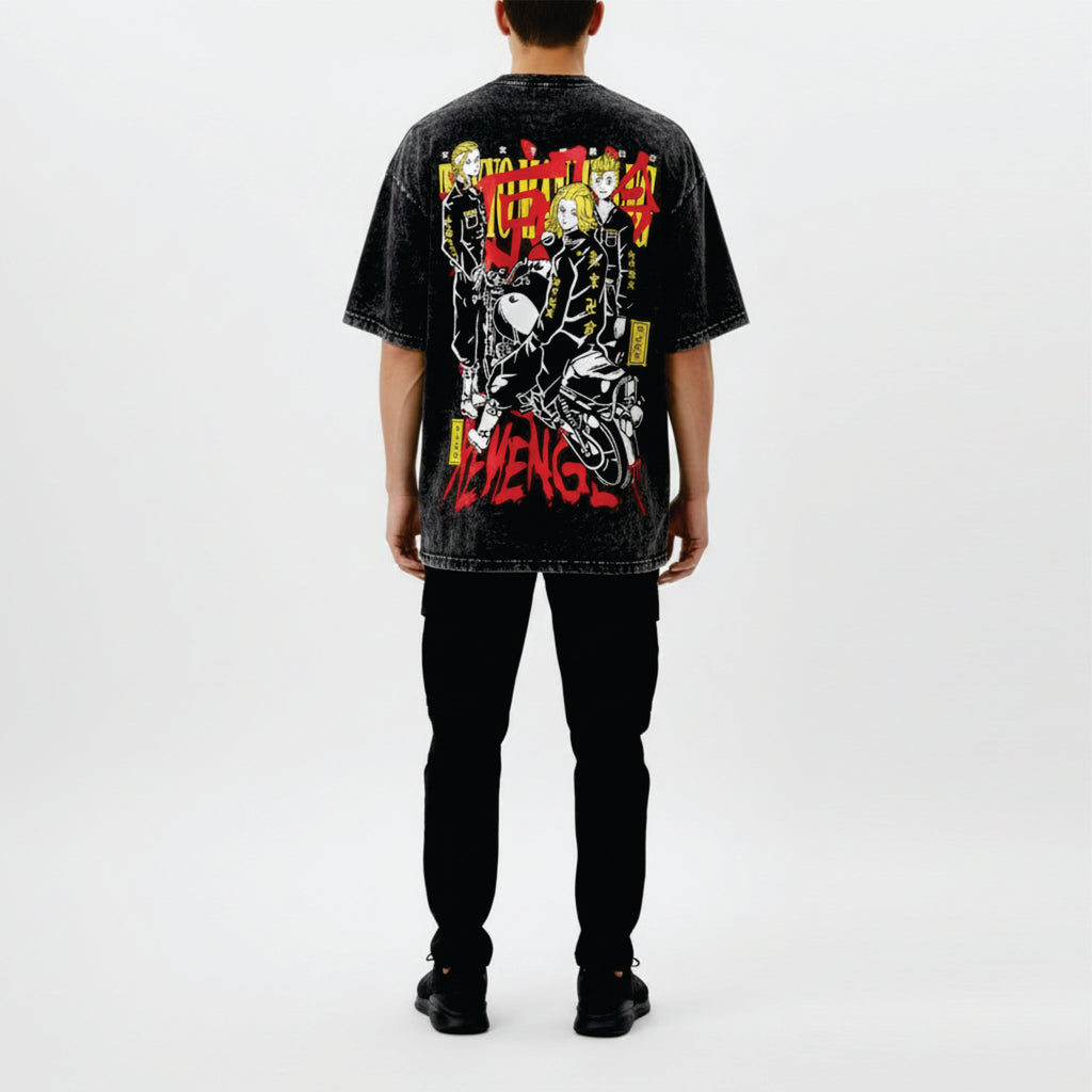Person wearing a black t-shirt with colorful graphic design on the back, standing against a white background