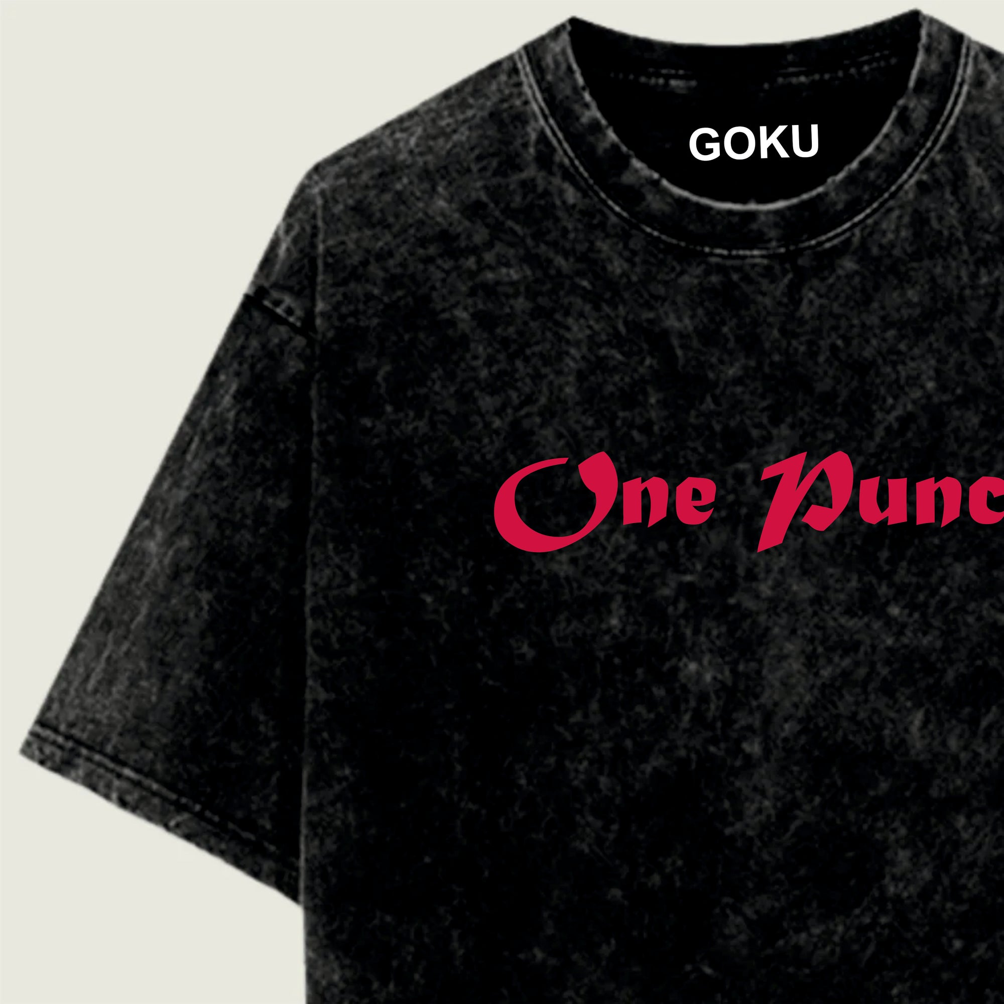 Black t-shirt with 'GOKU' and 'One Punch' text on a light beige background