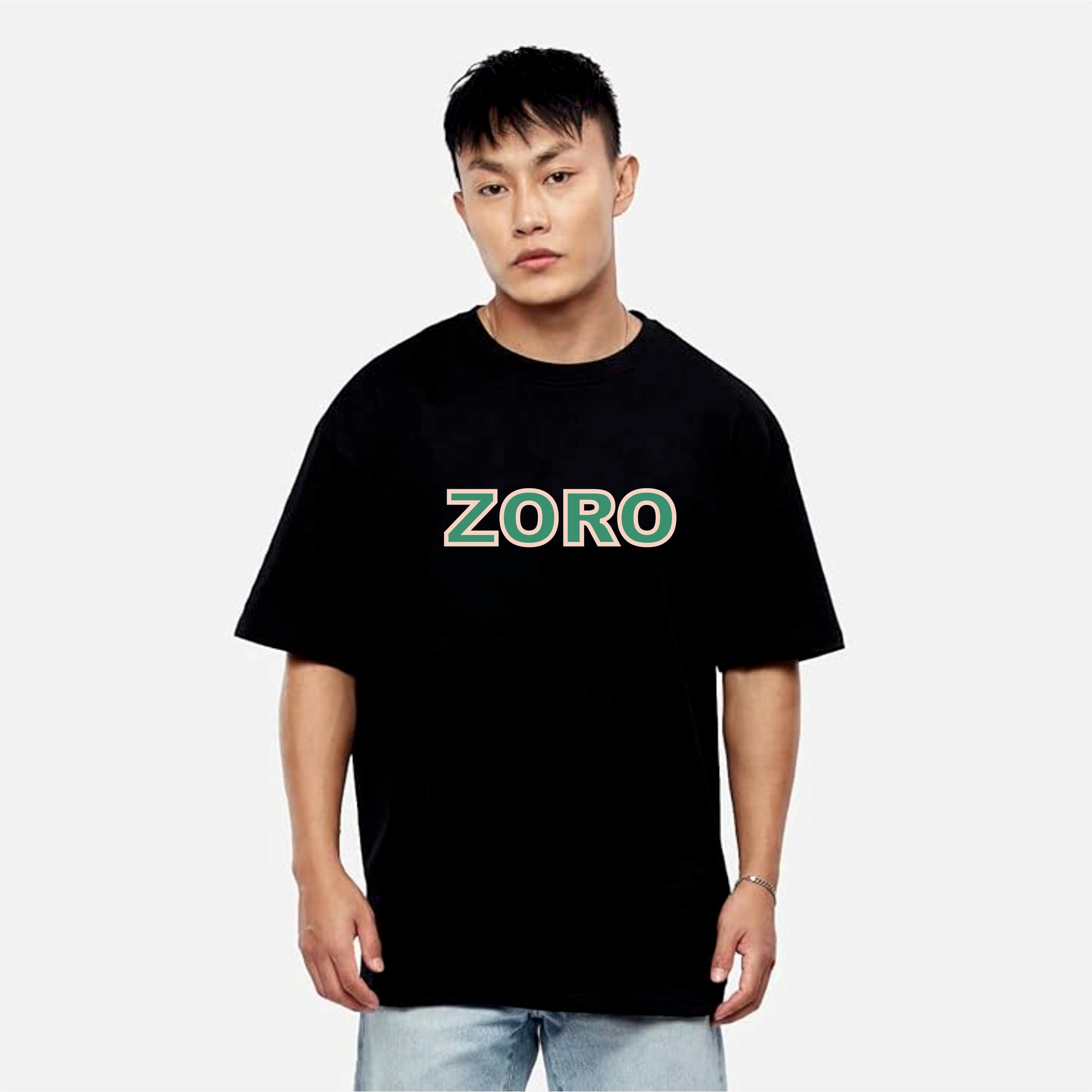 Person wearing a black t-shirt with 'ZORO' printed on it against a white background
