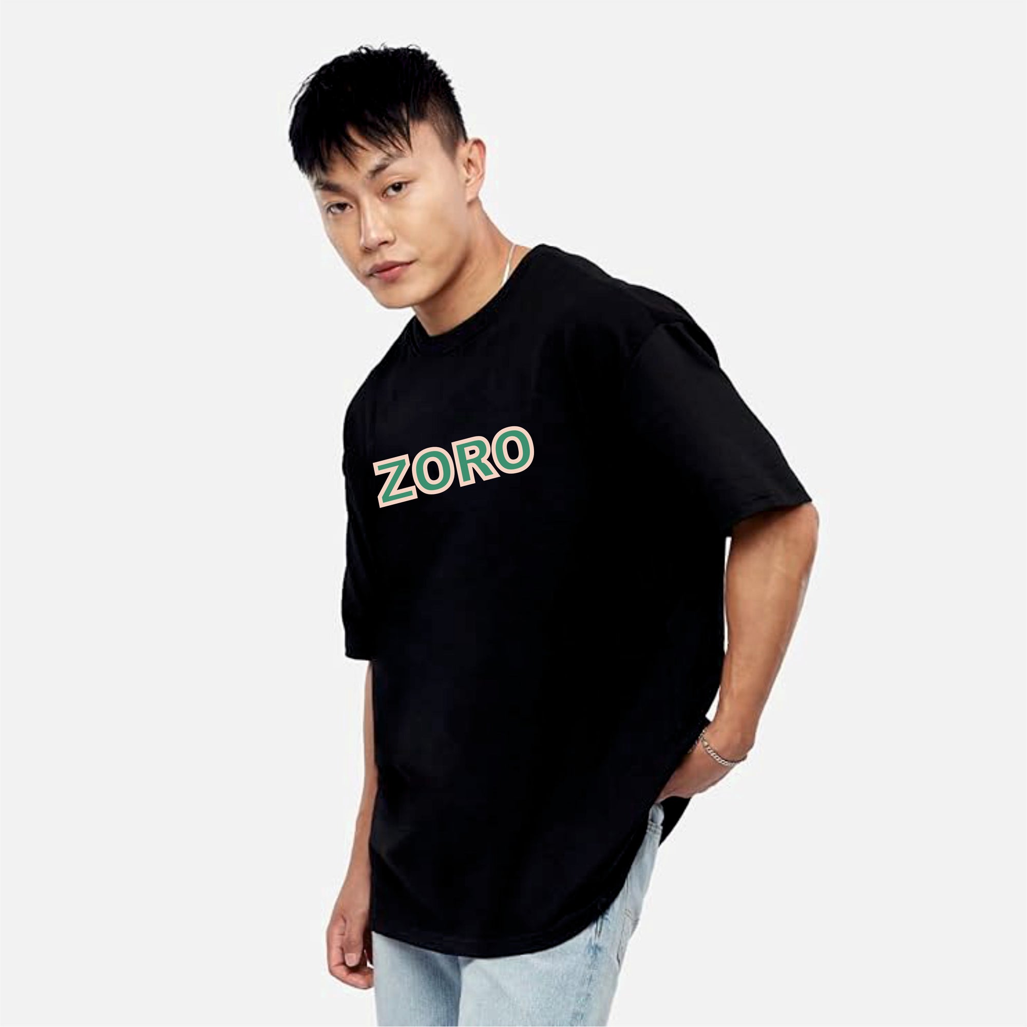 Person wearing a black t-shirt with 'ZORO' printed on it against a plain background
