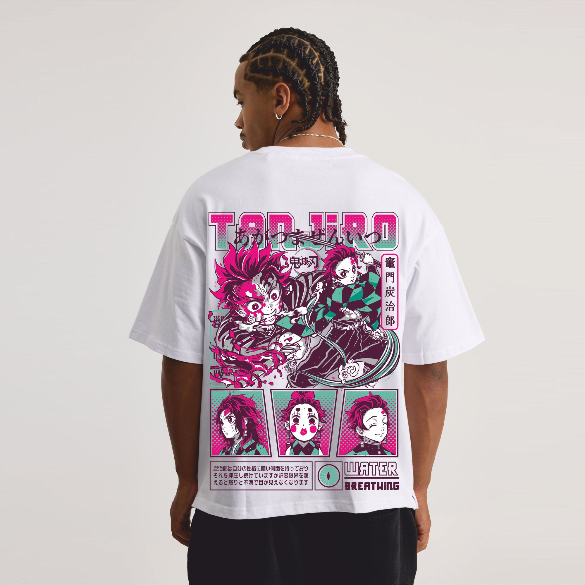Person wearing a white t-shirt with colorful graphic design on the back against a plain background