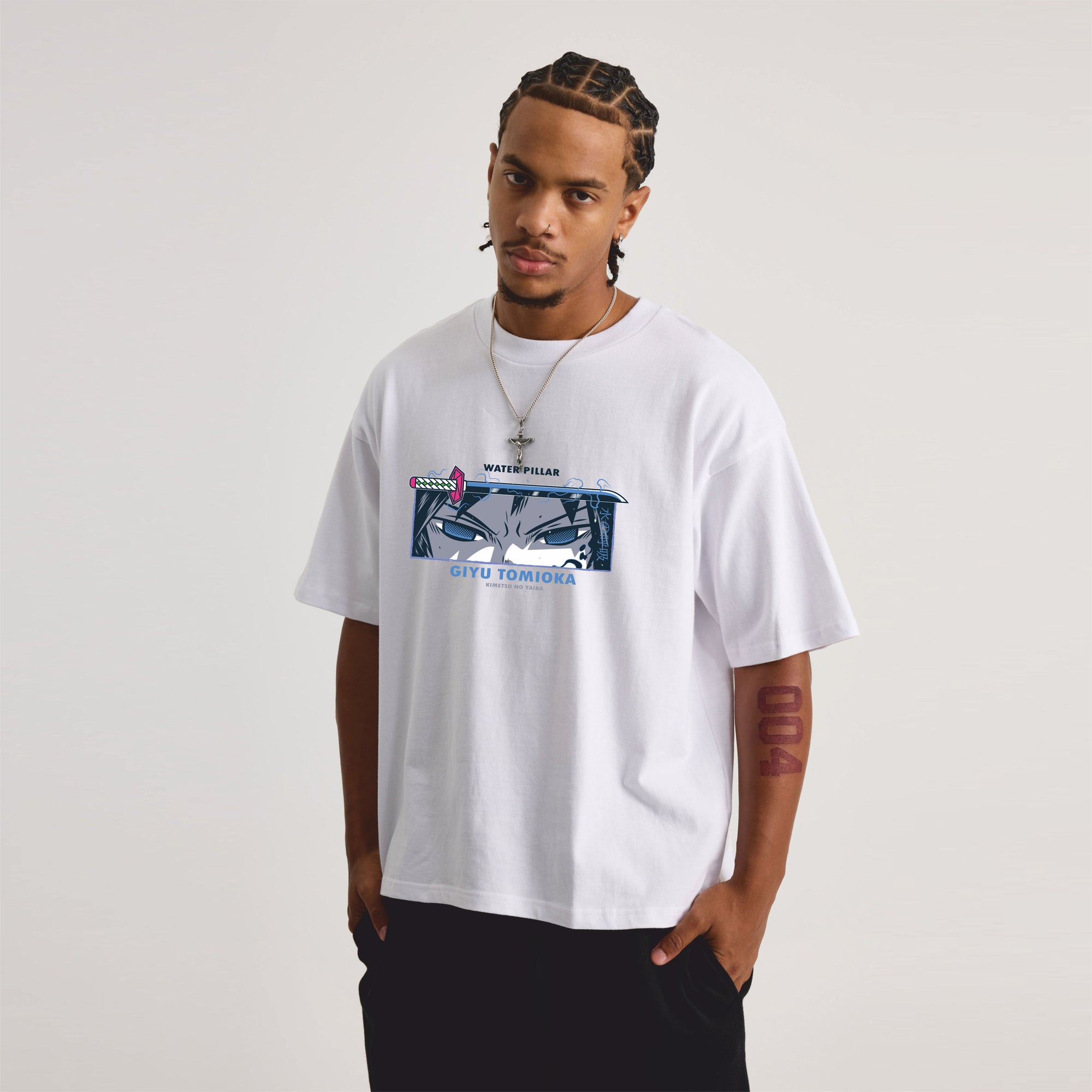 Person wearing a white t-shirt with graphic design