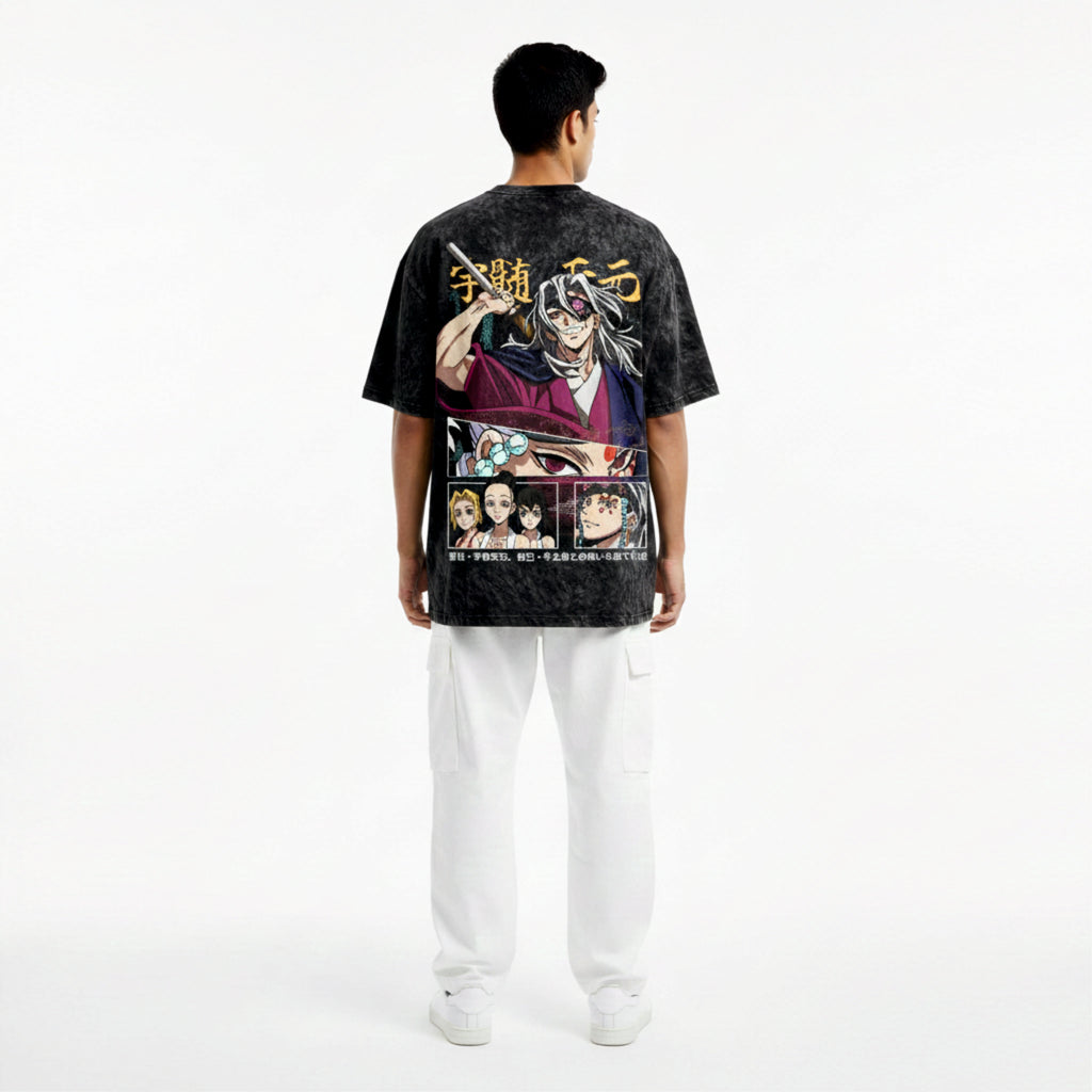 Person wearing a black t-shirt with colorful graphics and text on the back, standing against a white background.