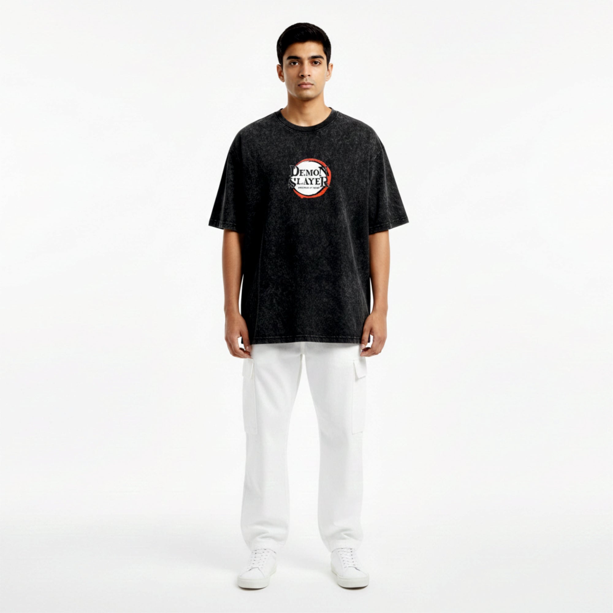 Person wearing a black t-shirt with a logo on a white background