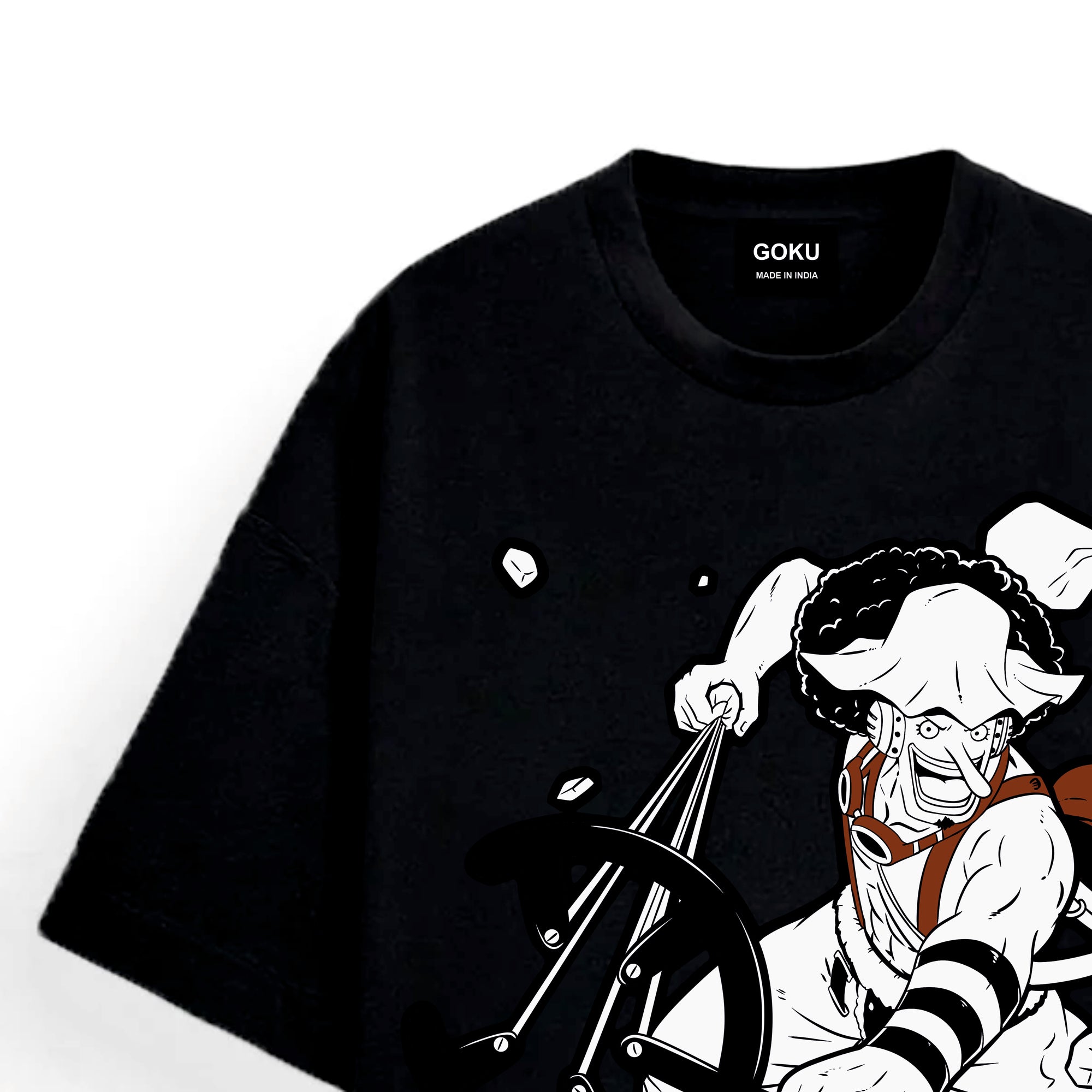Black t-shirt with a graphic design of a character holding a weapon on a white background