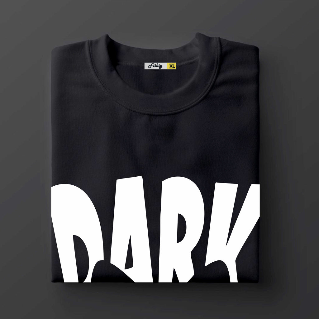 Black t shirt with 'DARK' printed in white on a dark background