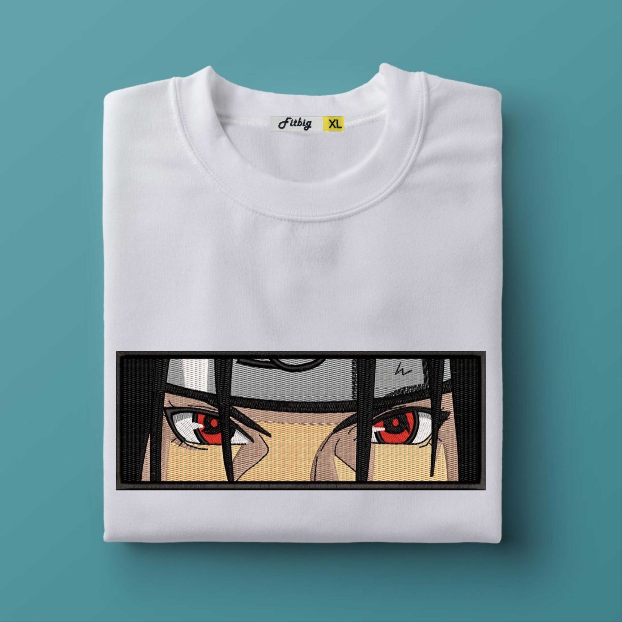 White t-shirt with anime-style eye design on a teal background