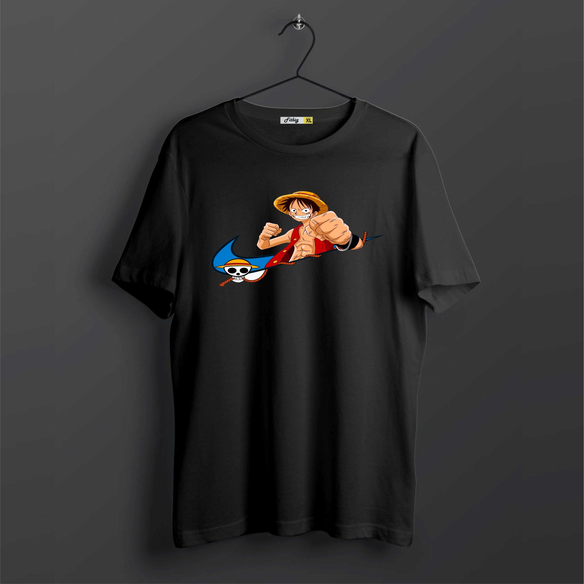 Black t-shirt with an anime character graphic on a dark background