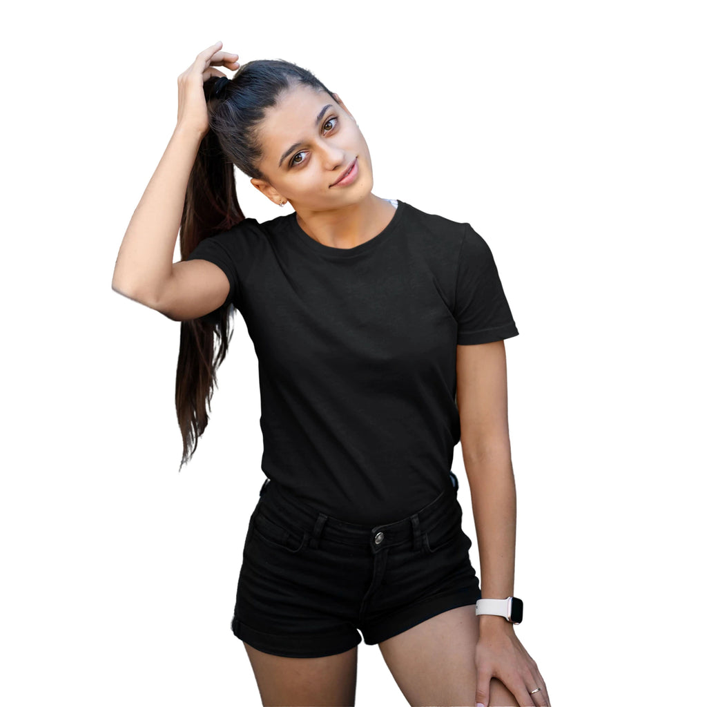 Woman wearing a black t-shirt and shorts on a white background