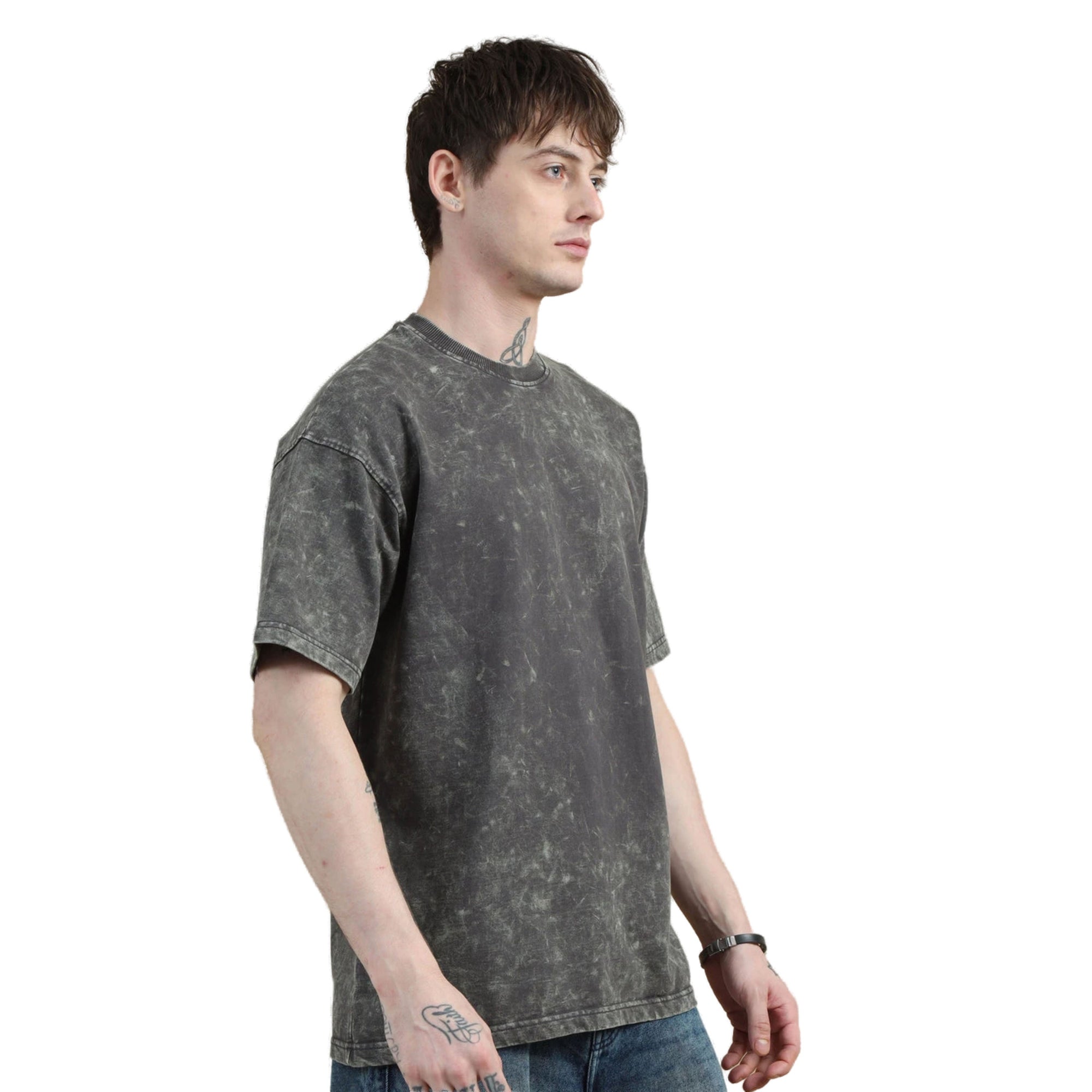 Man wearing a dark gray t-shirt on a white background