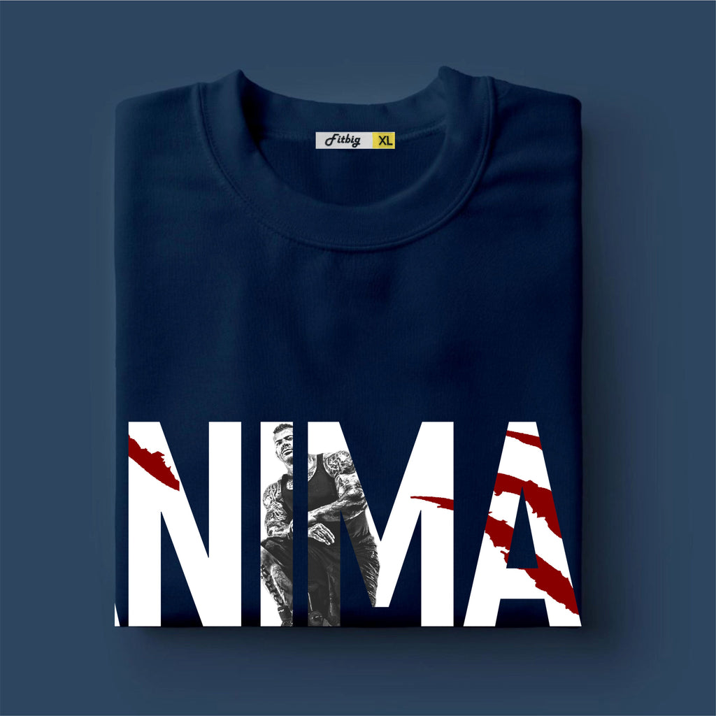 Folded navy blue t shirt with graphic design and 'NIMA' text on a dark blue background