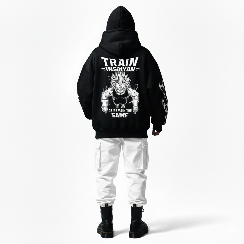 Person wearing a black hoodie with a graphic design and text on the back, standing against a white background.