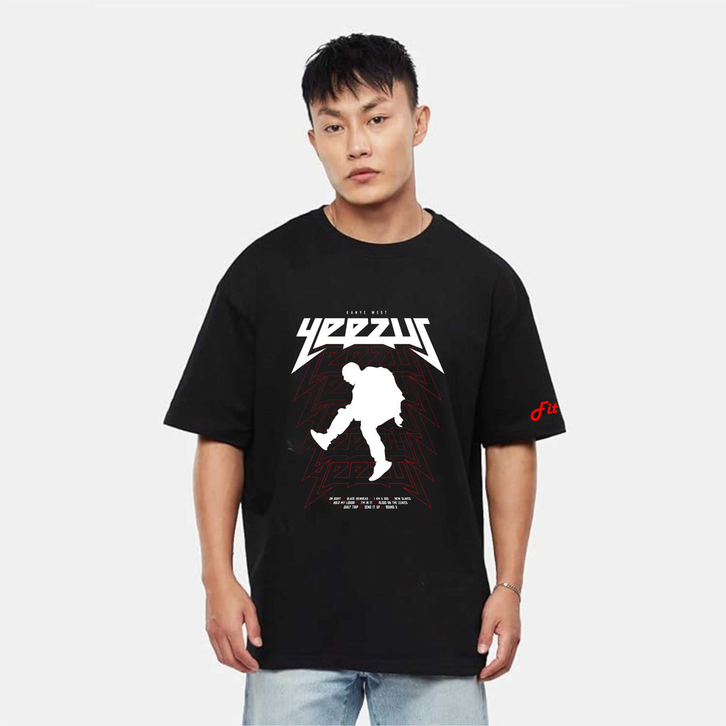 Person wearing a black t-shirt with a graphic design on a white background