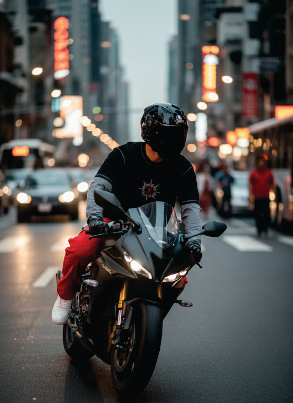 Person riding a motorcycle on a city street with neon lights in the background