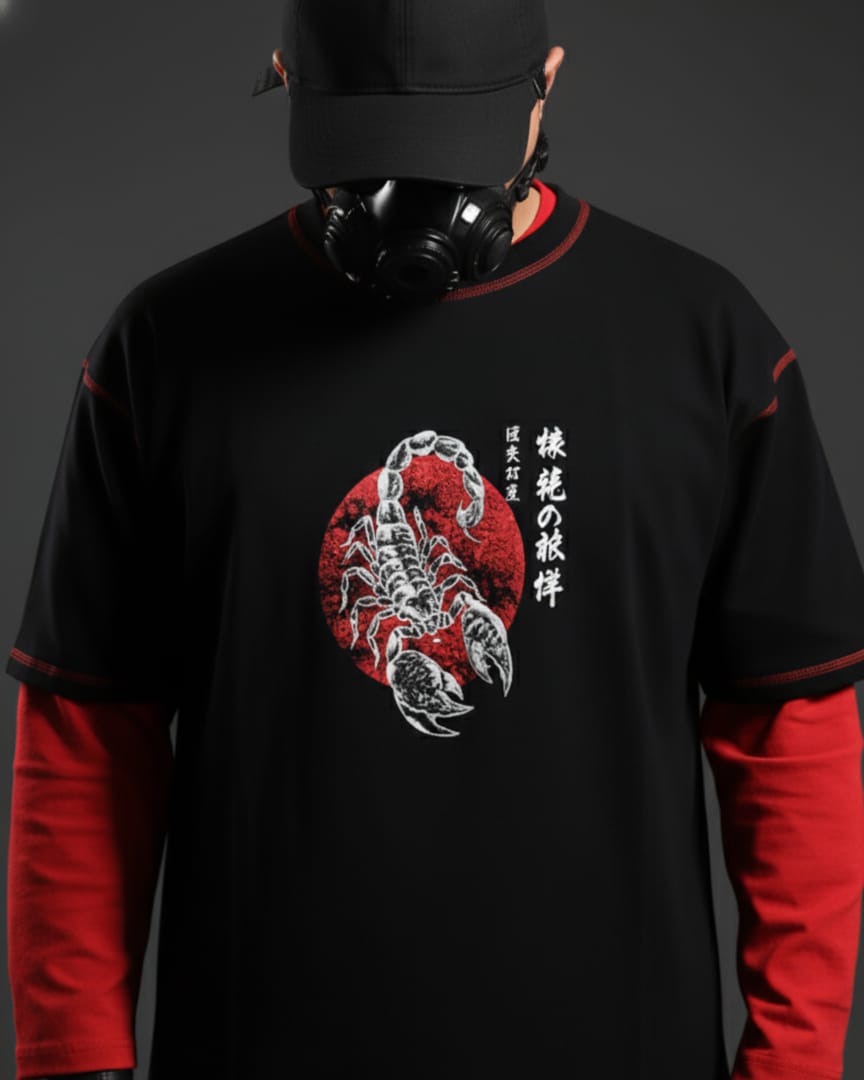 Person wearing a black and red shirt with a scorpion design and Japanese text.