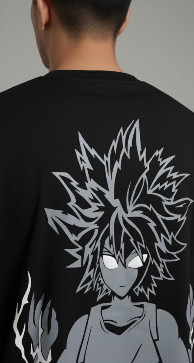 Black t-shirt with a graphic design of a character with spiky hair and flames on the back.